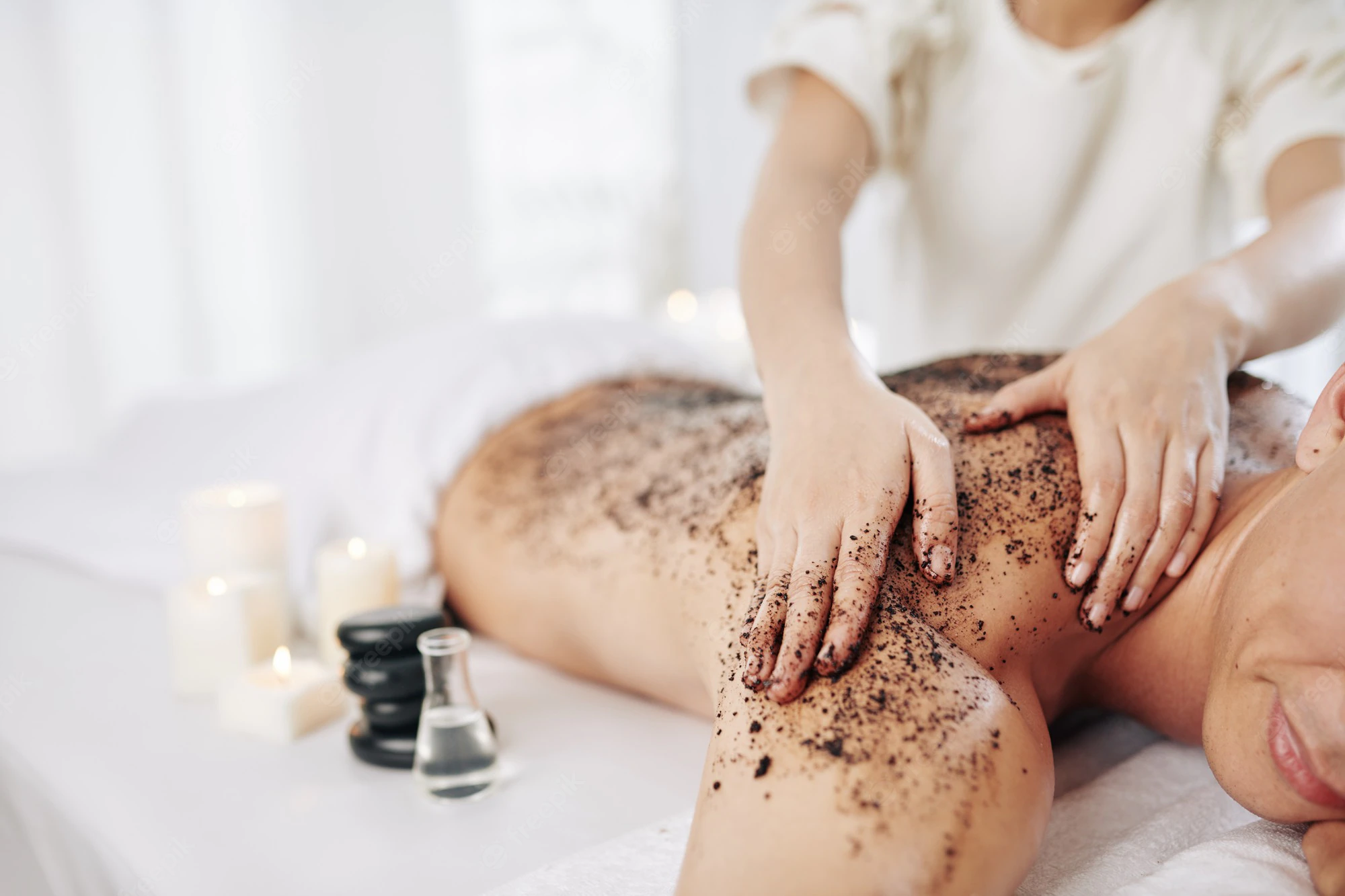 massaging-back-with-coffee-scrub_274689-12864